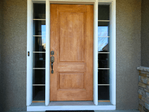 Entry door with glass sidelights